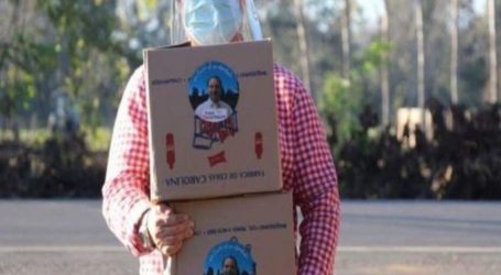 Diputado RN entrega cajas de alimentos y mascarillas con su foto